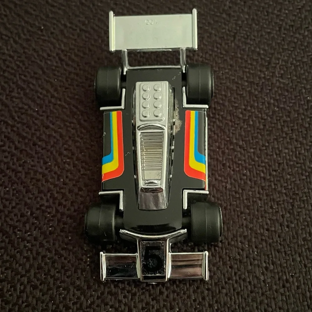 VTG 1979 Tonka black F1 race car w/ rainbow racing stripes